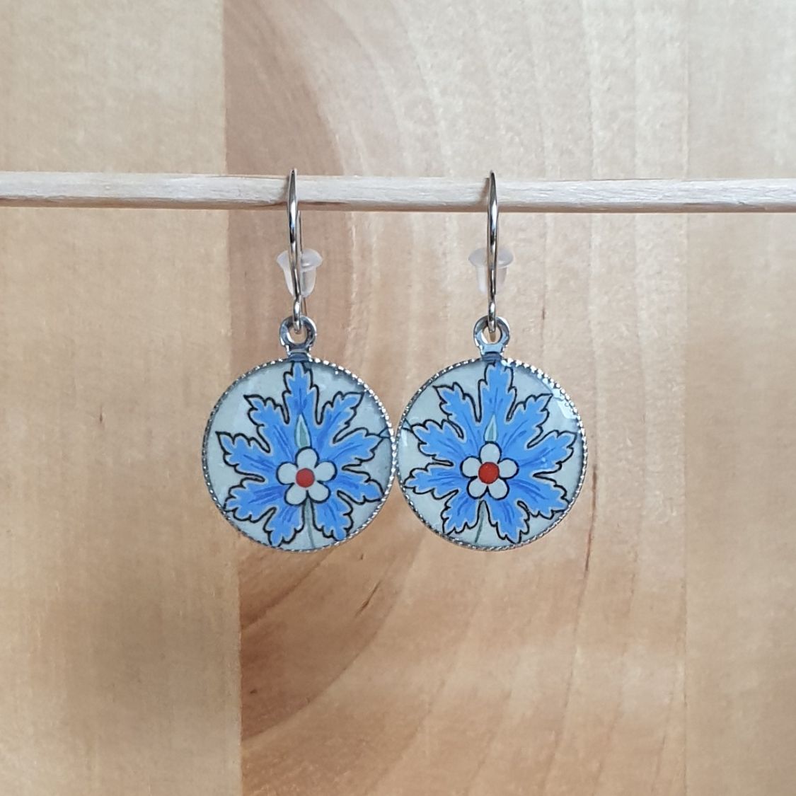 Boucles d'oreille pendantes fleur orientale bleue