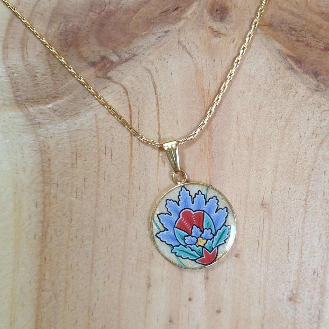 Collier pendentif fleur orientale bleue