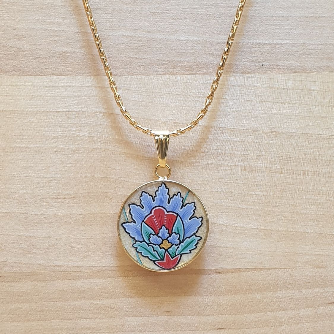 Collier pendentif fleur orientale bleue