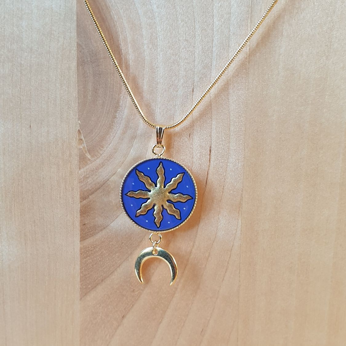 Collier pendentif soleil/étoile d'or