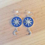 Boucles d'oreille pendantes enluminées étoile d'or blanc